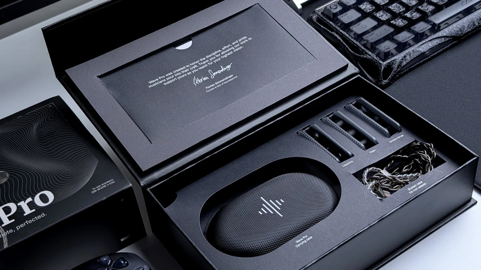 Soundbrenner Wave Pro 2 packaging with ear tips, case, and cable